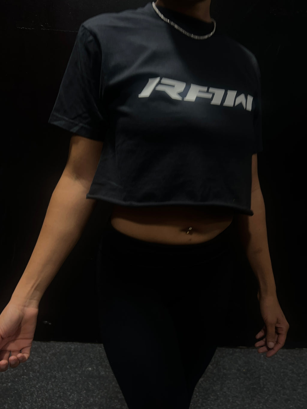 BROKEN RAW IMPACT CROP TOP IN BLACK